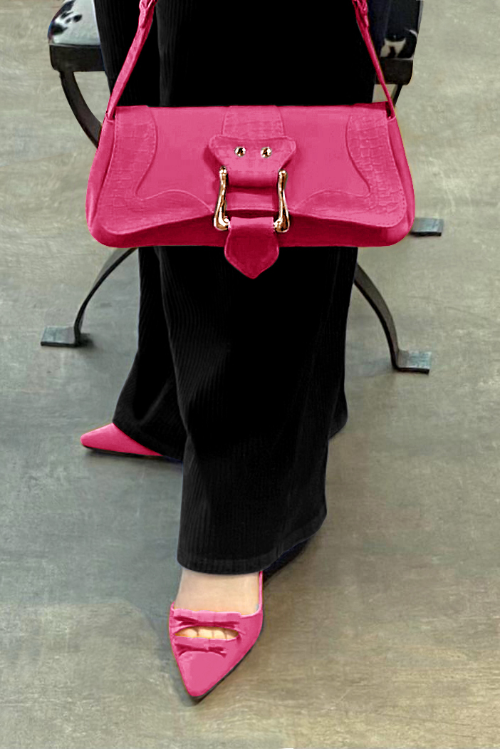 Fuschia pink women's dress handbag, matching pumps and belts. Worn view - Florence KOOIJMAN
